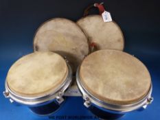 A pair of bongo drums in grey / brown perloid finish,