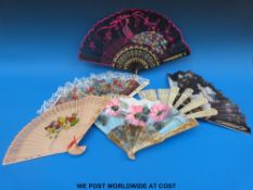 A collection of hand fans including a Chinese pierced bone fan and embroidered examples etc