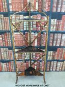 A late 19th/20thC Chinese bamboo and lacquer three tier whatnot