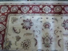 A good sized wool rug, wine,