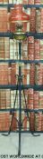 A 19thC wrought iron extending oil lamp converted to electricity with twin Duplex burners and a