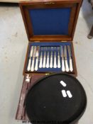 A walnut canteen case with lift out tray and mother-of-pearl handled cutlery,