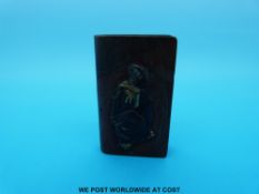 A bronzed vesta in the form of a book decorated with warriors to both sides (6 x 3.5 x 1.