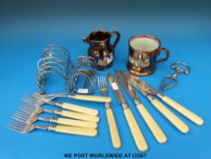 A lustre jug together with a similar tankard, silver plated toast rack,