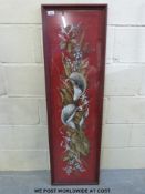 A large framed beadwork embroidery of Arum lilies amongst foliage on a red ground (127 x 38)