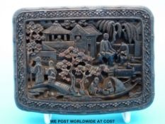 A 19thC Chinese carved tortoiseshell box decorated to all sides with figural scenes and dragons,