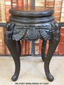 A Chinese carved wooden table / jardiniere stand (50cm tall,