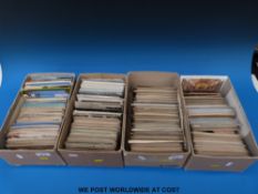 Four boxes of postcards including topographical, ecclesiastical buildings,