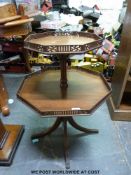 A mahogany two tier octagonal table (width of lower level 53cm x height 74cm)