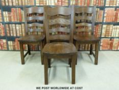 Four solid seat oak ladderback chairs