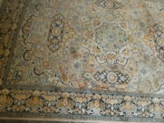 Two silk floral and foliate design rugs on pale pink/beige ground (one 215cm x 142cm,