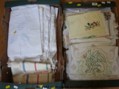 Two trays of textiles including Irish linen, embroidered items, bedspreads, tray cloths,