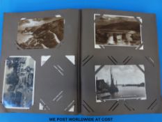 An album of postcards to include ship aground 1913, Lake Vyrnwy, Treharris, Lulworth, Newcastle,