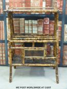 A c1900 Oriental bamboo and lacquer magazine rack and table (75 x 55 x 37cm)