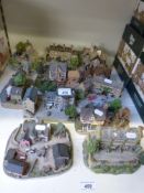 A collection of Lilliput Lane cottages etc including 