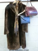 A vintage fur coat, a fur stole,