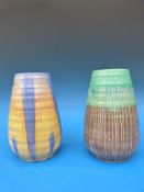 Two vases, one green and brown with trailing decoration,