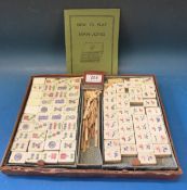 A bone and bamboo Mah Jong set