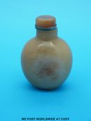 An 18thC/19thC Chinese russet/ mutton fat jade snuff bottle with russet jade and white metal