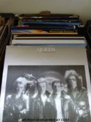 Over 35x LPs from the 1970s and 1980s including artists such as Status Quo, Genesis, ELO,
