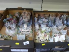 Two trays containing 26 unboxed Lilliput Lane buildings, including some larger examples,