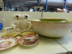 A pair of Royal Doulton Staffordshire style dogs, two trios,