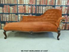 A 19thC carved rosewood framed chaise longue