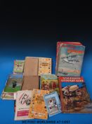 A collection of football-related ephemera and annuals including Champion, Playfair,