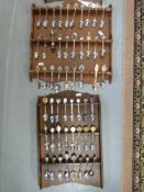 A collection of over 160 souvenir teaspoons on display boards, from USA,