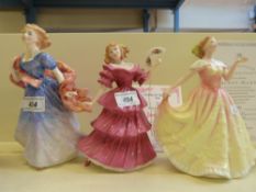 Three Royal Doulton figurines comprising two figures of the year, 'Jennifer' HN3447 1994,