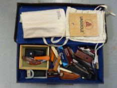 A collection of folding knives,