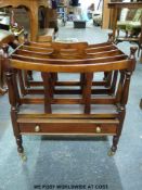 A reproduction canterbury with drawer below and carry handle to top