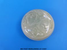An 18th-19thC Chinese celadon circular ink pot with stork and cloud decoration (9cm diameter)