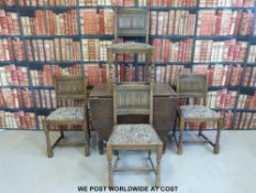 An oak drop leaf table (length 90cm) together with a set of four dining chairs