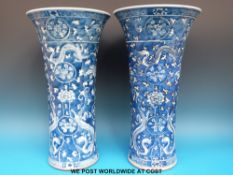 A pair of large Chinese blue and white dragon decorated vases with flared lip (37cm tall)