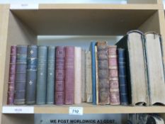 A collection of sundry volumes including 'Les Petites Filles Modeles', 'Le Larousse Pour Tous',