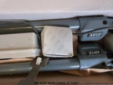 A boxed unused electric gate opener