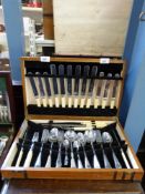 A Robinsons of Sheffield cutlery set in wooden case,