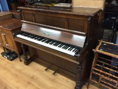 A Broadwood & Sons rosewood piano.