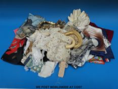 Mixed textiles to include lace, kid gloves, Dior, Patou, and Mappin & Webb scarves,