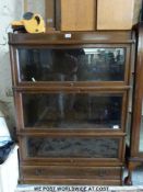 A Globe Wernicke style three tier bookcase with drawer below ( w87 x d30 x h120cm)