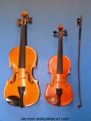 A Rumanian 3/4 violin (label for Stentor music) cased,