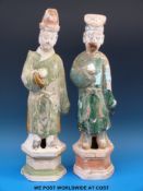 A pair of Chinese Ming dynasty funerary figures with removable heads (40cm tall)