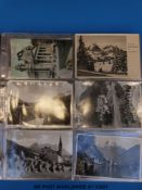 An album of world postcards to include France, Switzerland, Scilly Isles,