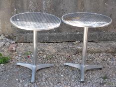 Two brushed steel garden tables