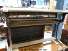 A folding school desk with cast iron supports (length 101cm)