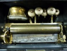 A cylinder musical box playing eight airs on a standard combe with five bells and a eight beater