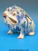 A Japanese pottery potpourri holder in the form of a toad with blue glaze (14cm tall)