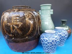 A collection of Chinese and Korean ceramics to include a large jar decorated with symbols,