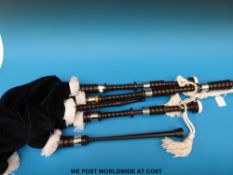 A cased set of rosewood bagpipes by Kilberry,